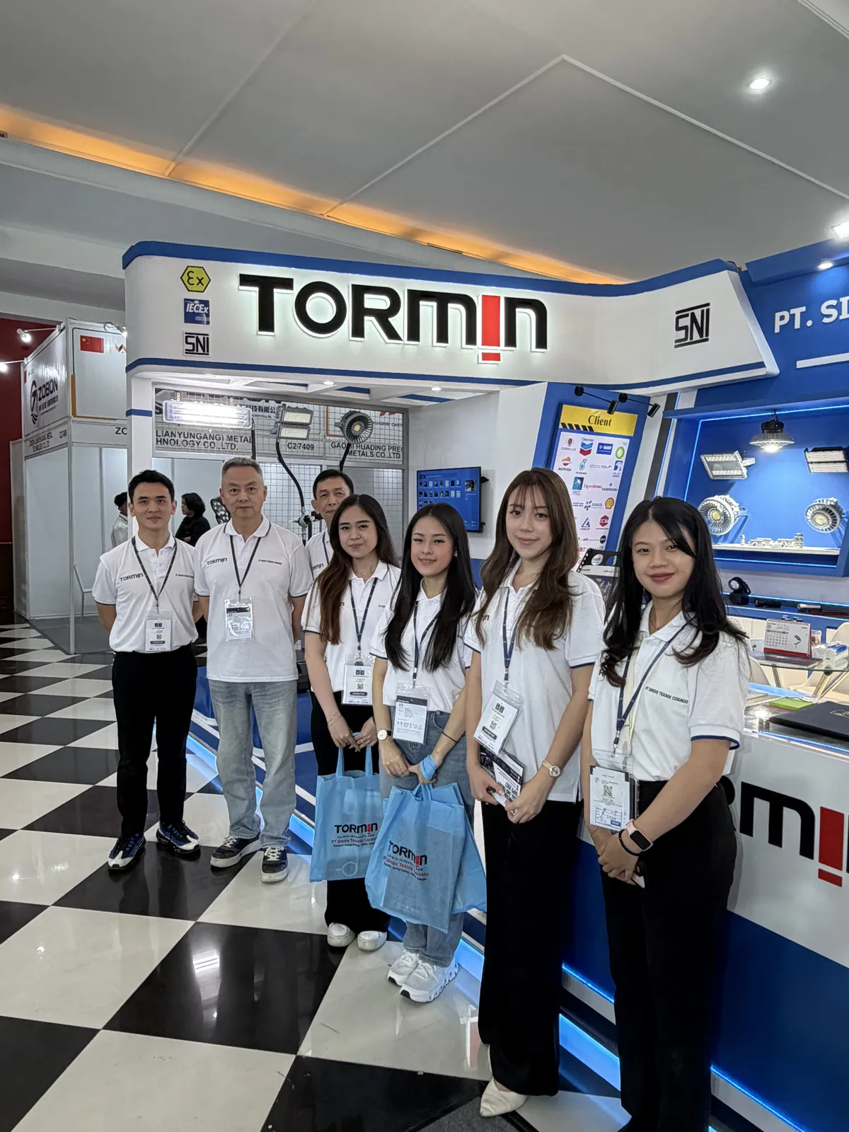 Team photograph at the TORMIN and PT Sindo stand in Jakarta.