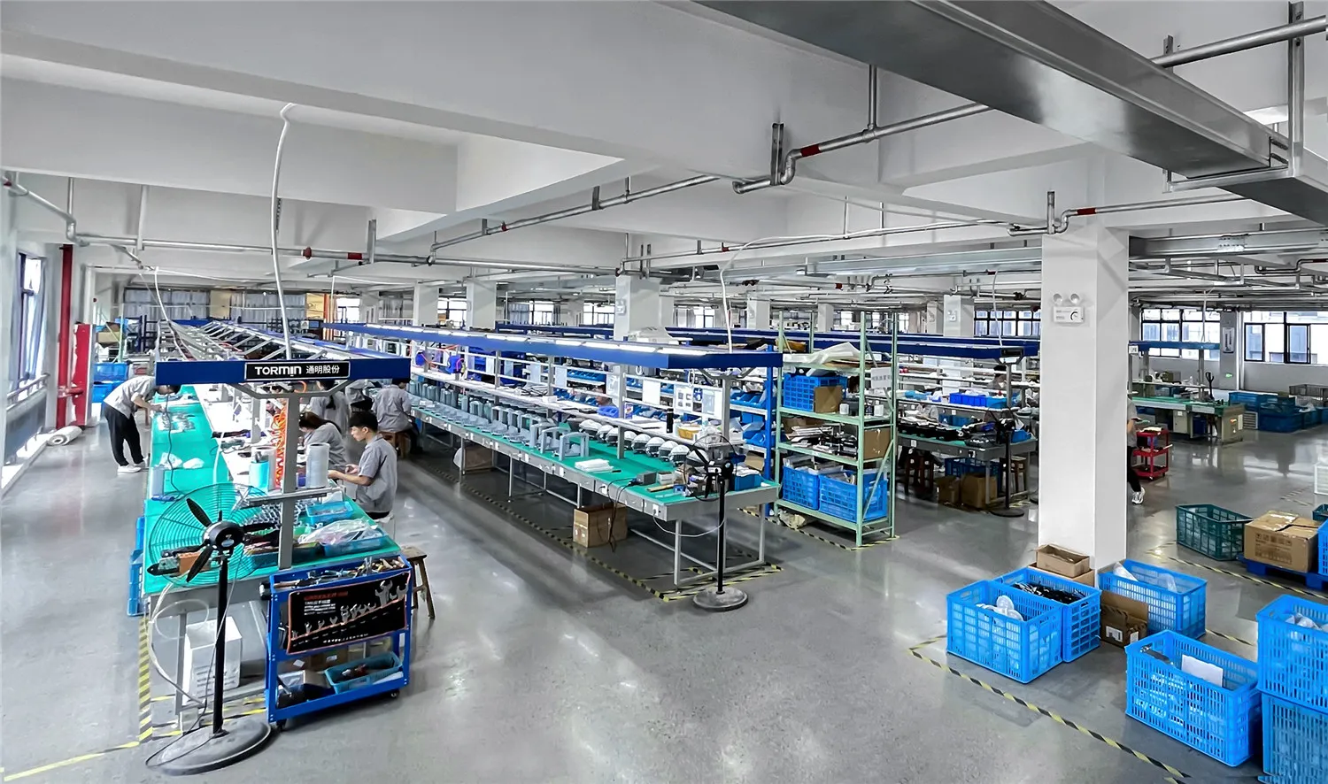 Lighting assembly workstations inside the TORMIN factory