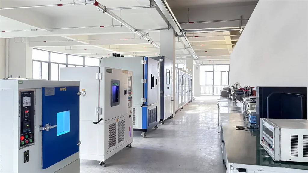 Environmental test chambers and bench equipment in the TORMIN lighting laboratory.